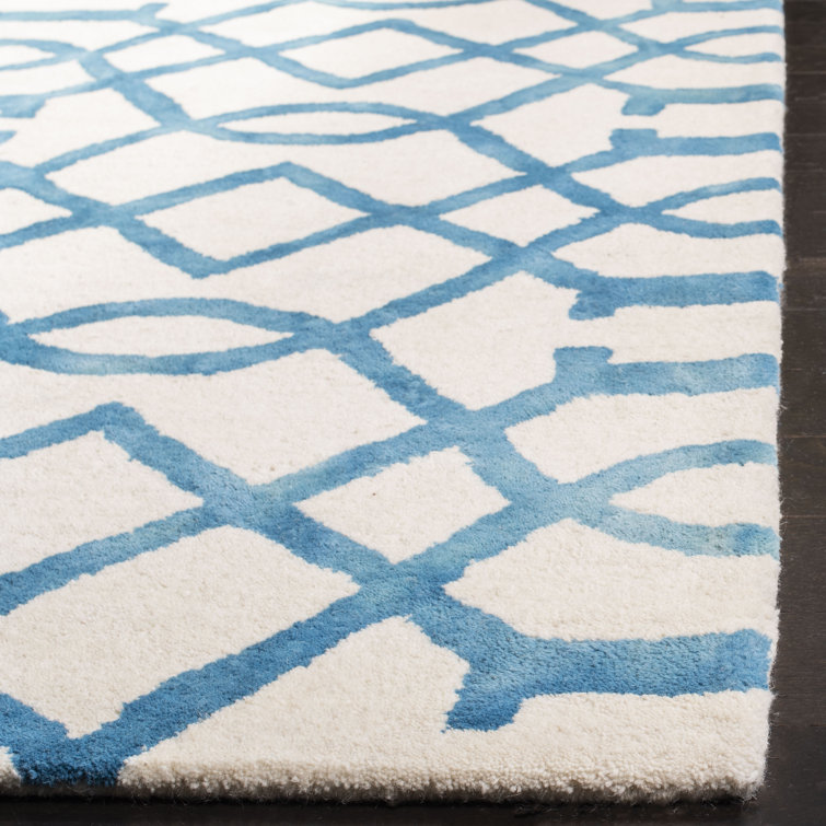Ivory and Turquoise Hand-Tufted Wool 6' x 9' Area Rug