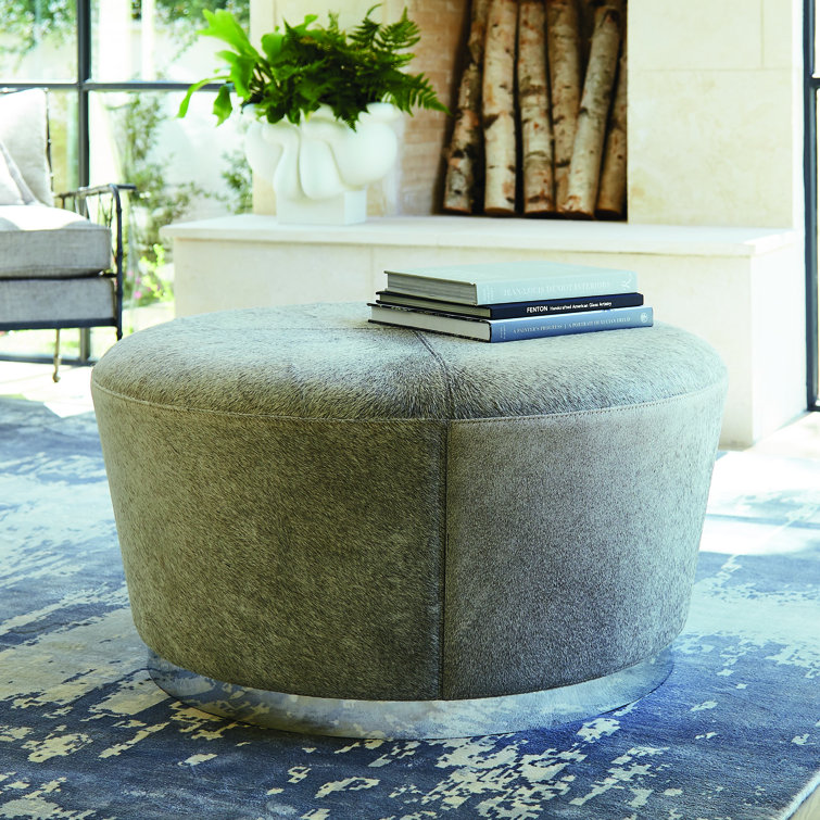 Round Gray Hair-on-Hide Ottoman with Nickel Trim