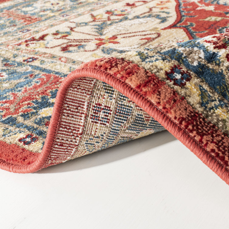 Regal Medallion 8' x 10' Red and Navy Polypropylene Area Rug