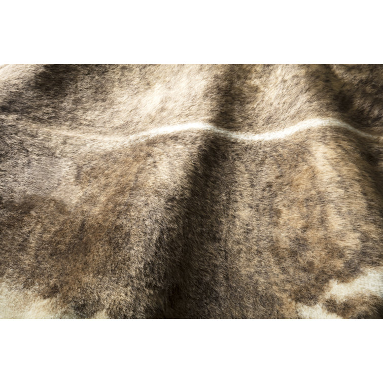 Beige and Brown Faux Cowhide Stain-Resistant Rug