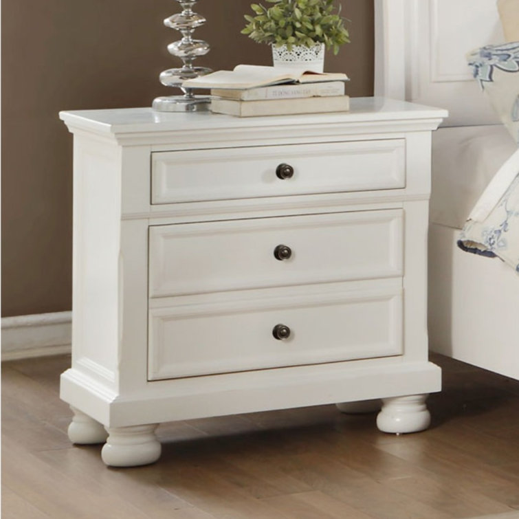 White Wooden Nightstand with Hidden Drawer and Bun Legs