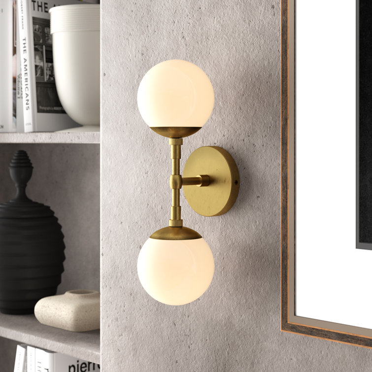 Polaris Dual-Orb Glass and Antique Brass Wall Sconce