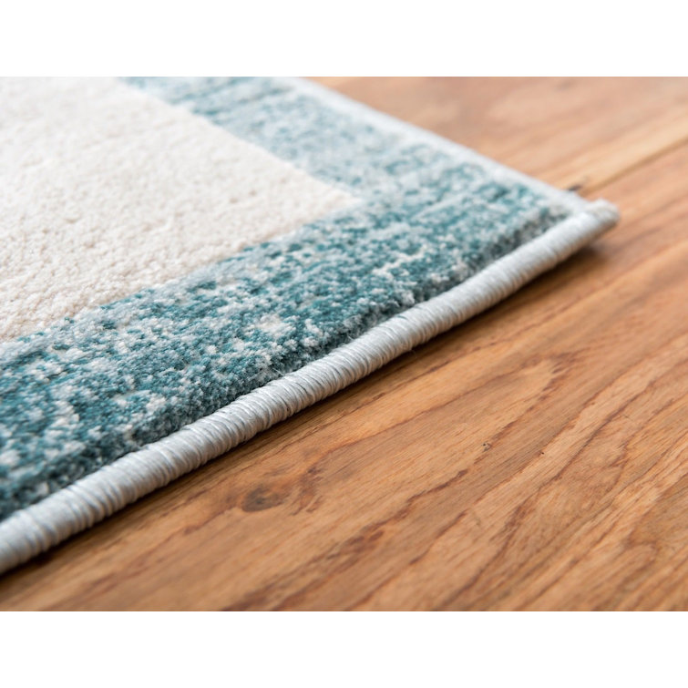 Turquoise and Ivory Rectangular Synthetic Area Rug