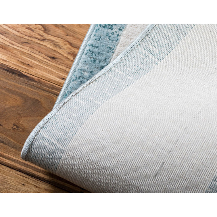 Turquoise and Ivory Rectangular Synthetic Area Rug