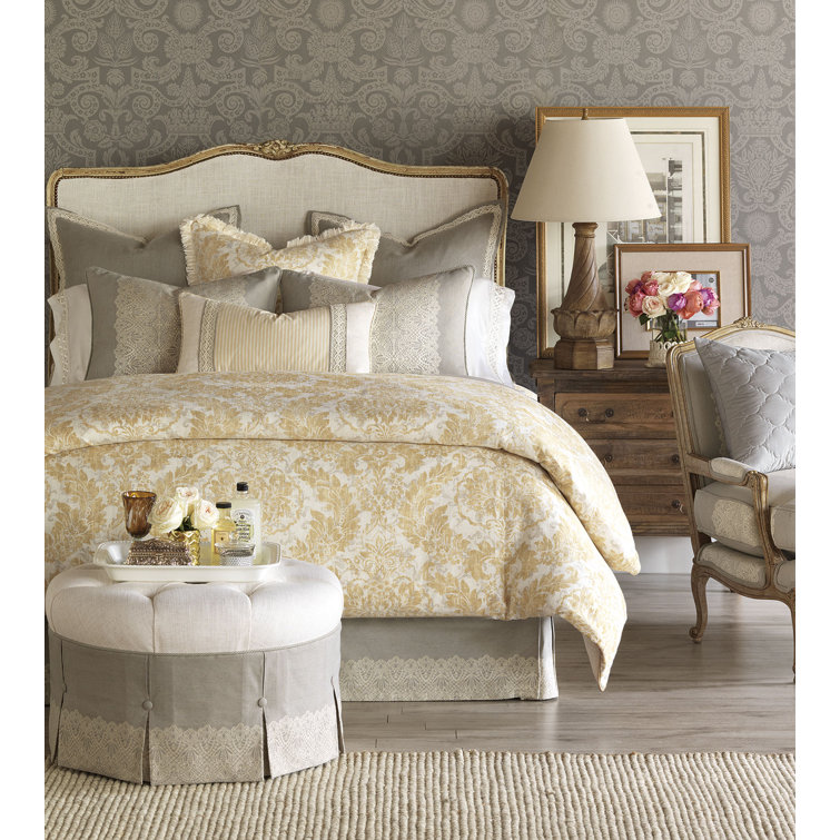 Beige Tufted Round Ottoman with Nailhead Trim