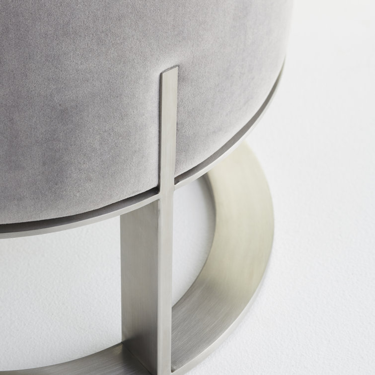 Contemporary Velvet-Cushioned Round Ottoman in Brushed Steel