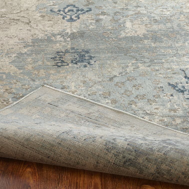 Handmade Blue and Ivory Abstract Synthetic Area Rug, 2' x 3'