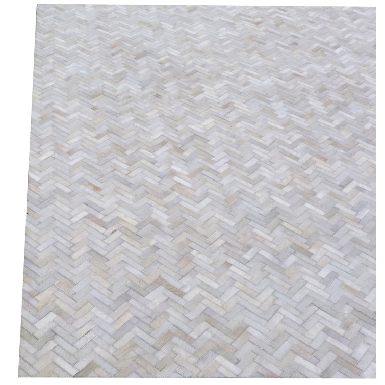 Handmade Ivory Geometric Cowhide 8' x 11' Area Rug