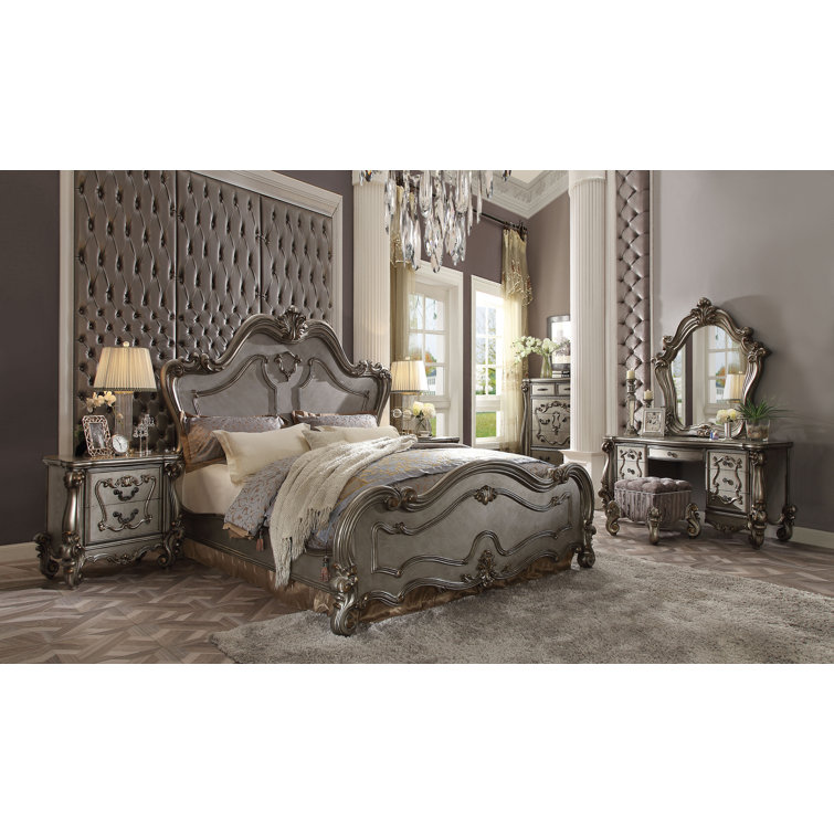 Regal Elegance Queen Bed with Carved Scrollwork and Storage Drawers