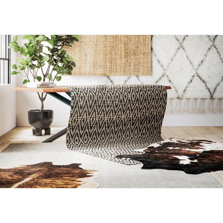 Beige and Brown Faux Cowhide Stain-Resistant Rug