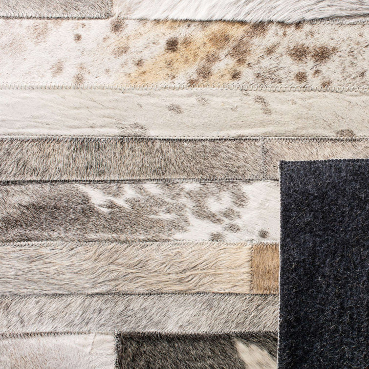 Handmade Geometric Gray Cowhide Accent Rug - 27" x 7"