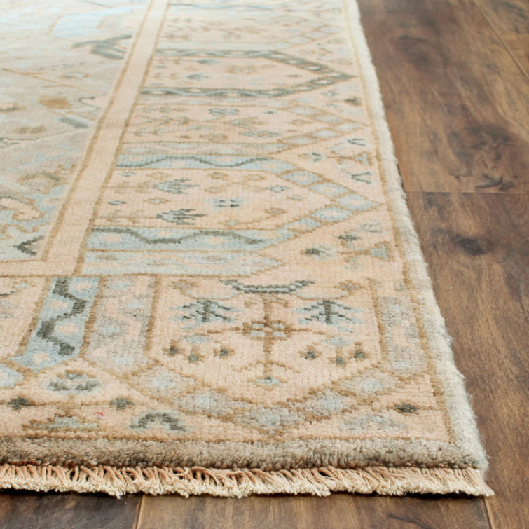 Ivory Hand-Knotted Wool 6' x 9' Area Rug