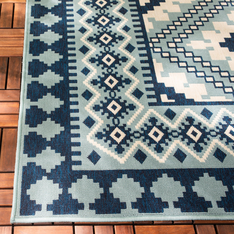 Ivory and Blue Square Synthetic Southwestern Rug