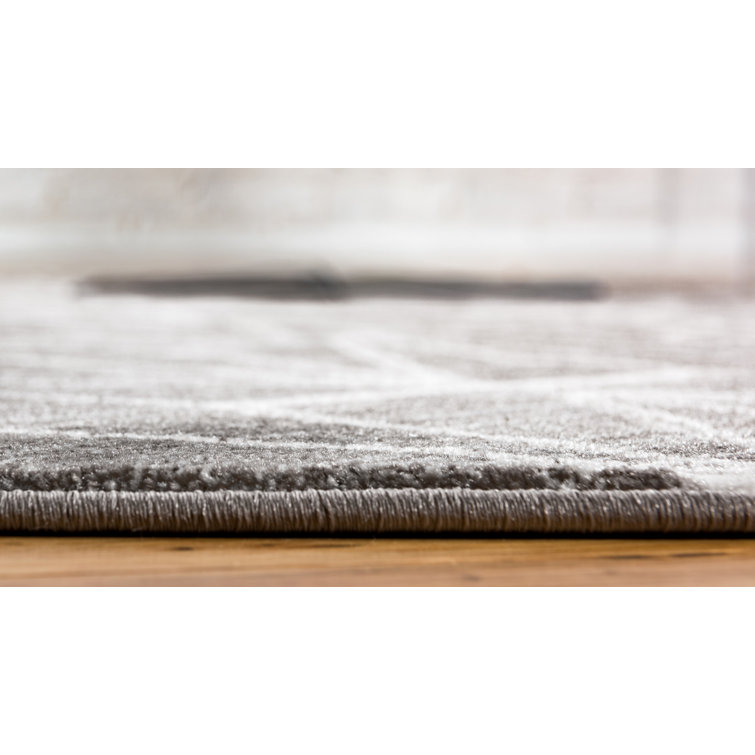 Manhattan Sophisticate Gray Synthetic 9' x 12' Easy-Care Rug