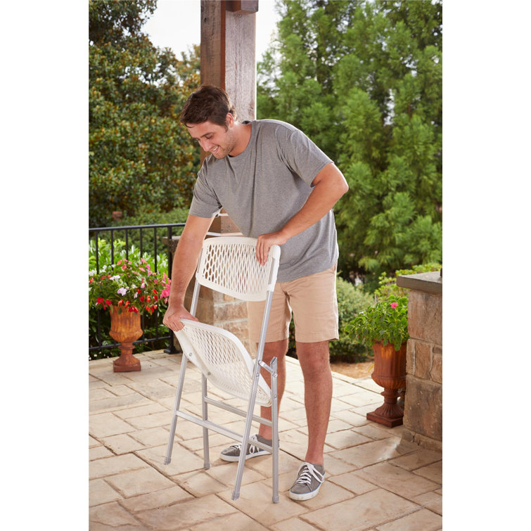 White Metal and Plastic Armless Folding Chair