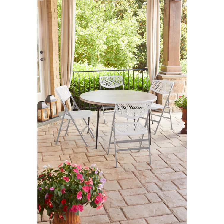 White Metal and Plastic Armless Folding Chair