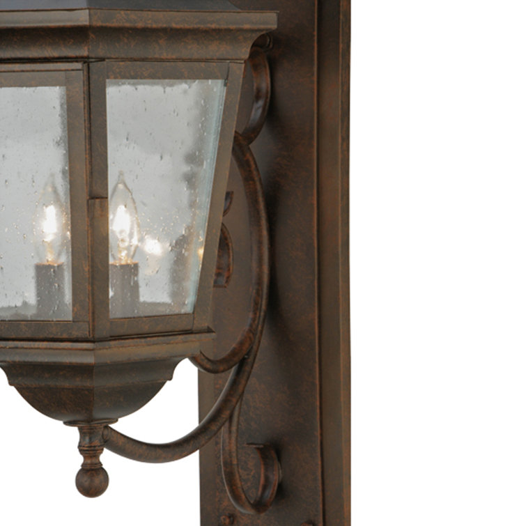 Cassandra Brown Iron Lantern Wall Sconce with Clear Glass