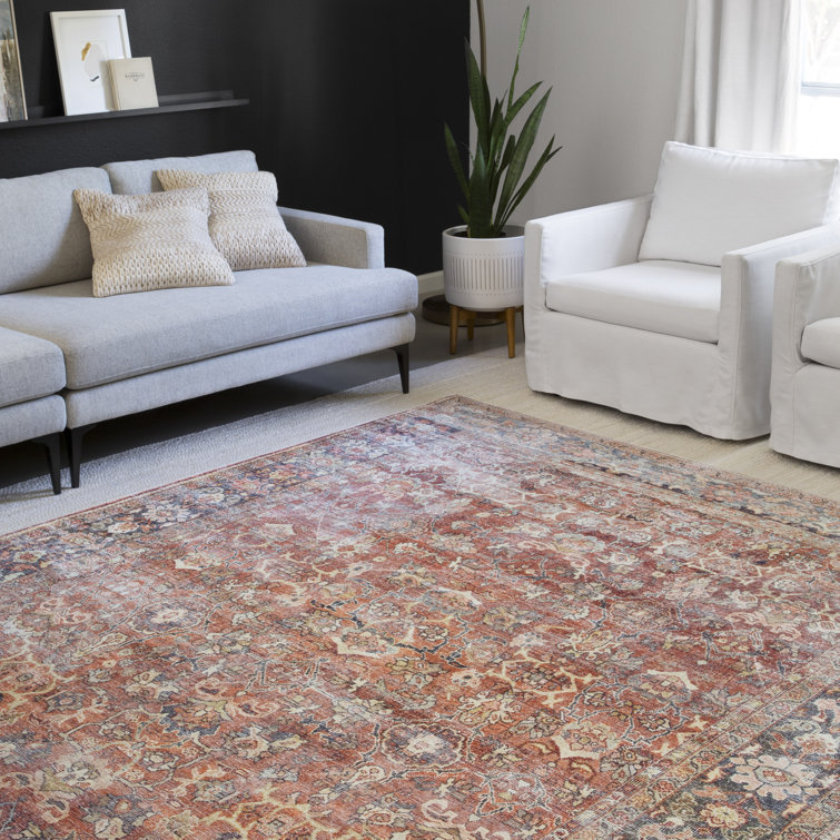 Terracotta and Blue Geometric Synthetic 9' x 12' Area Rug