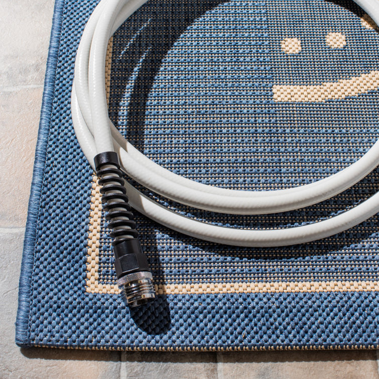 Rectangular 5' x 7' Blue and Natural Cotton Synthetic Rug