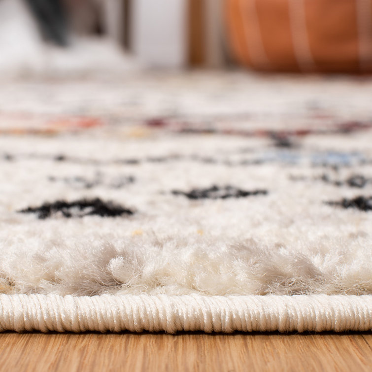 Ivory Multi Geometric 4' x 6' Easy-Care Synthetic Area Rug