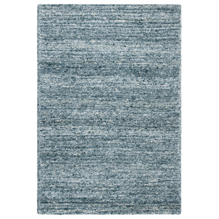 Handmade Himalaya Tufted Blue Wool Rectangular Rug - 5' x 8'