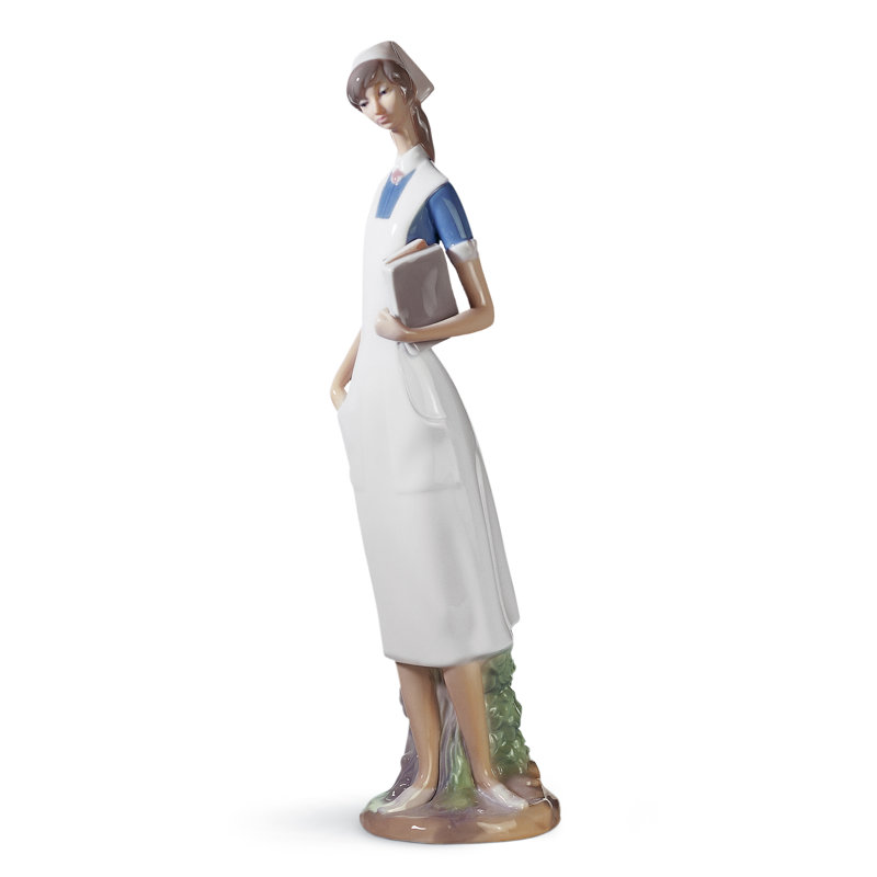 Matte White Porcelain Nurse Figurine with Delicate Petal Details