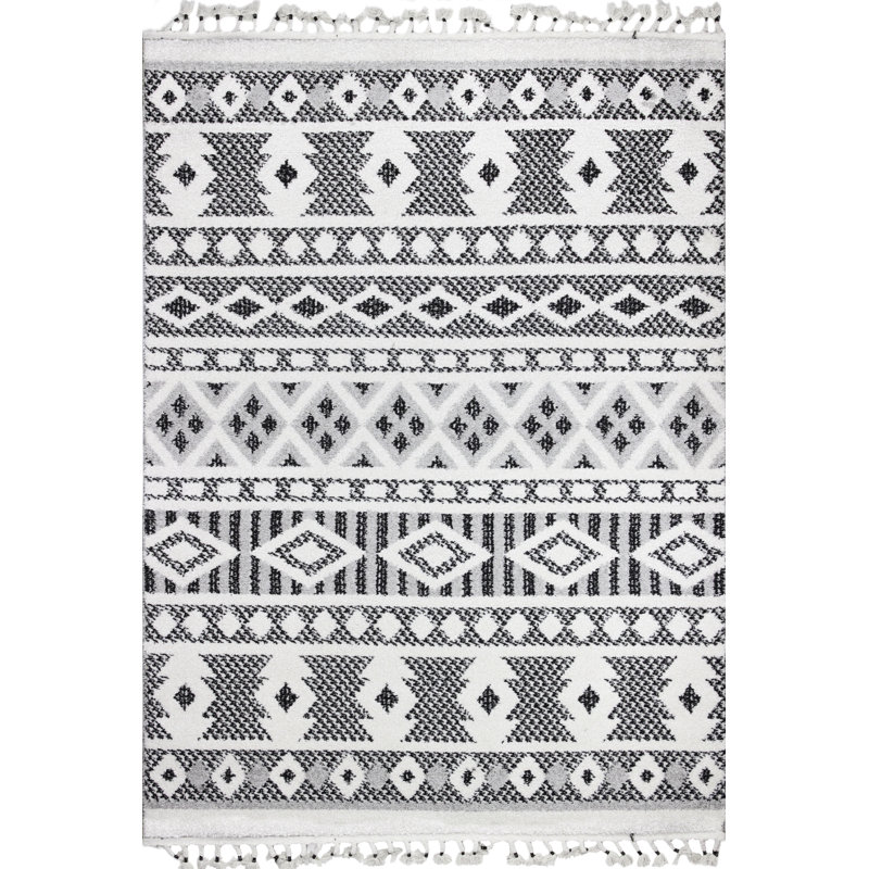 Handmade Geometric Black Synthetic 8' x 10' Stain-Resistant Rug