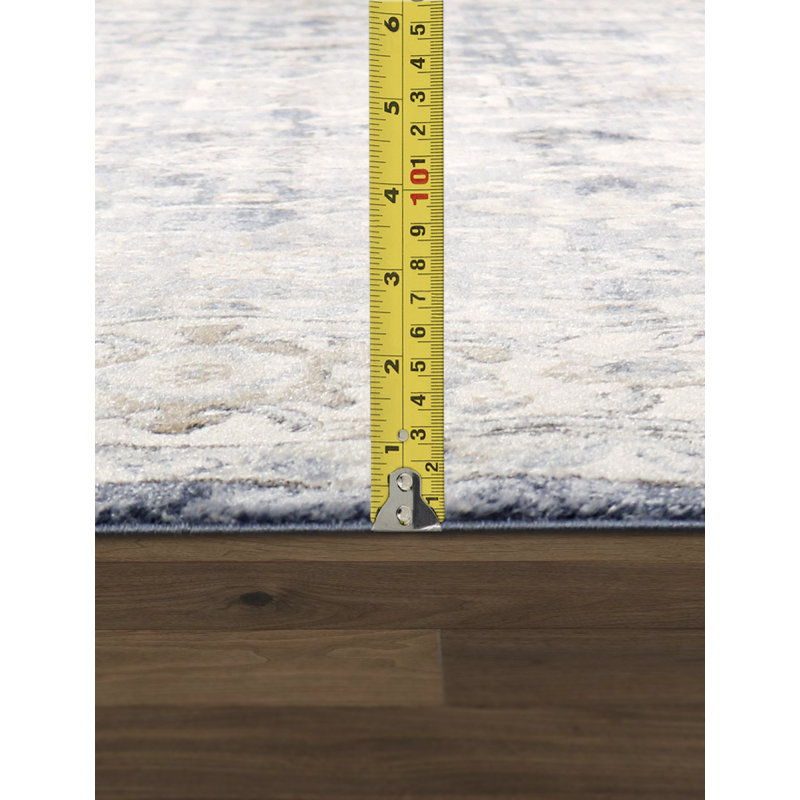 Beige and Blue 6' x 9' Synthetic Rectangular Area Rug