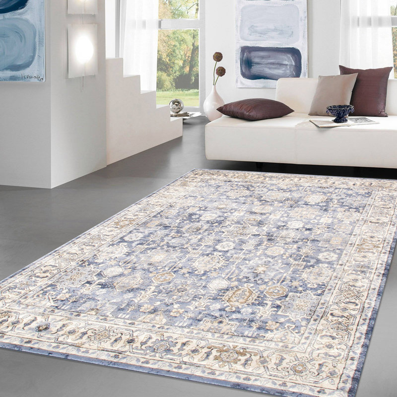 Beige and Blue 6' x 9' Synthetic Rectangular Area Rug