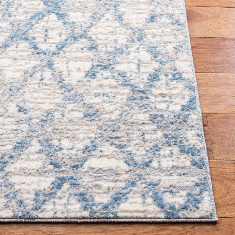Ivory Abstract 5' x 7' Hand-Knotted Synthetic Area Rug