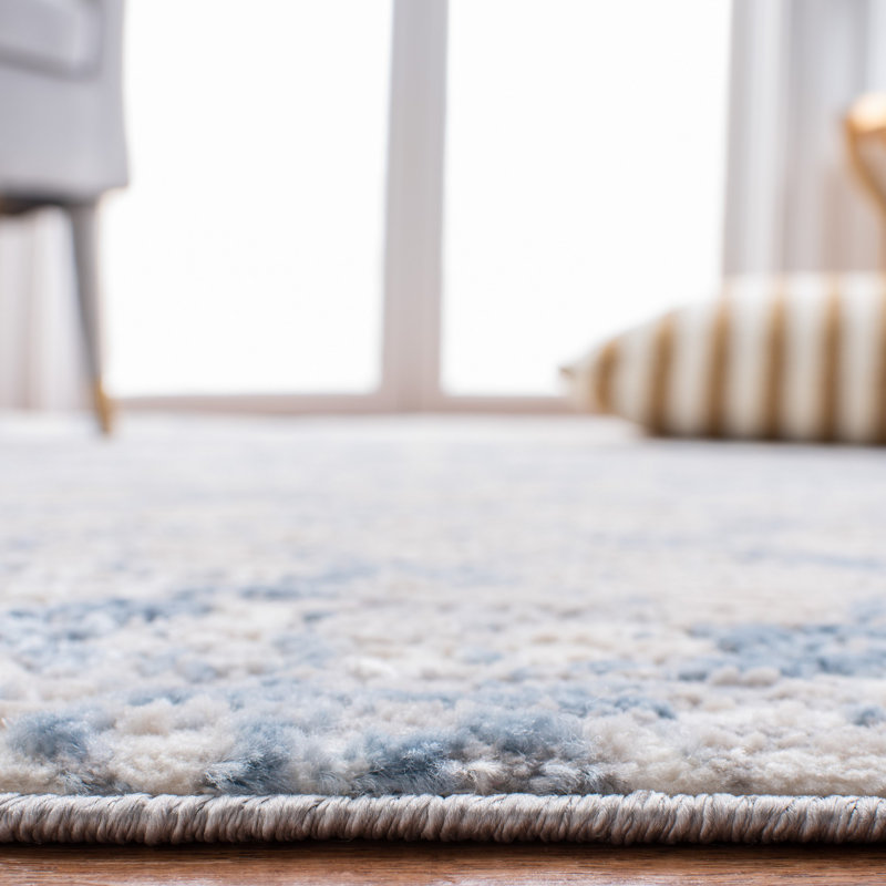 Ivory Abstract 5' x 7' Hand-Knotted Synthetic Area Rug