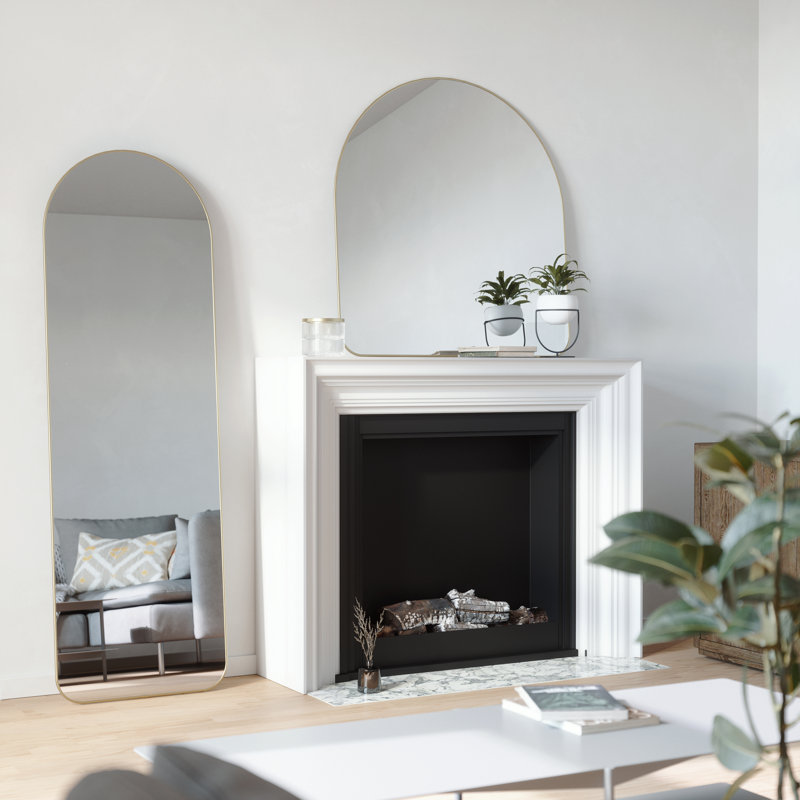 Elegant Arch Brass Leaning Floor Mirror with Sleek Metallic Rim