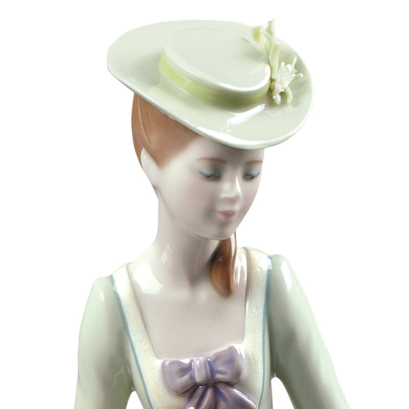 Elegant Pastel Porcelain Lady Figurine with Flowers