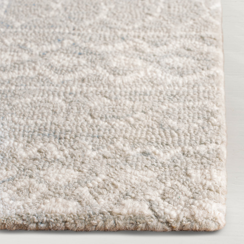 Ivory Hand-Knotted Wool 10' x 14' Area Rug