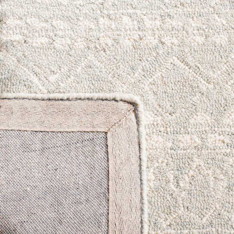 Ivory Hand-Knotted Wool 10' x 14' Area Rug