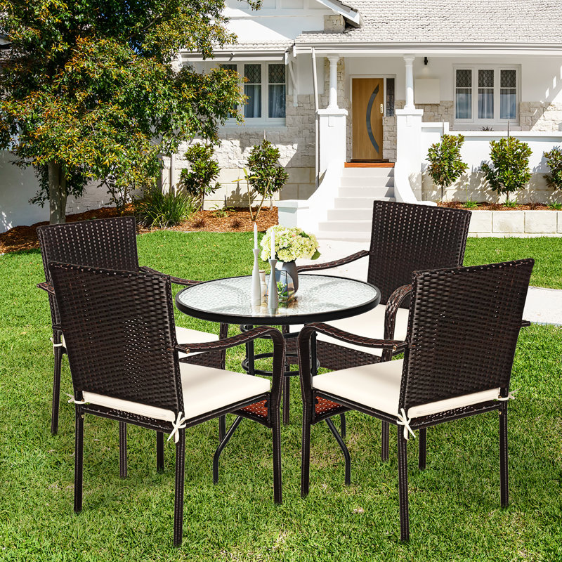 Set of 4 Brown Rattan Dining Chairs with Off-White Cushions