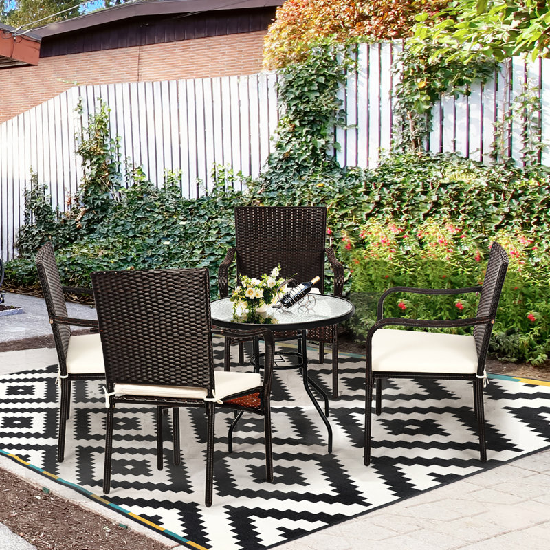 Set of 4 Brown Rattan Dining Chairs with Off-White Cushions