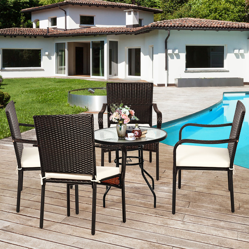 Set of 4 Brown Rattan Dining Chairs with Off-White Cushions