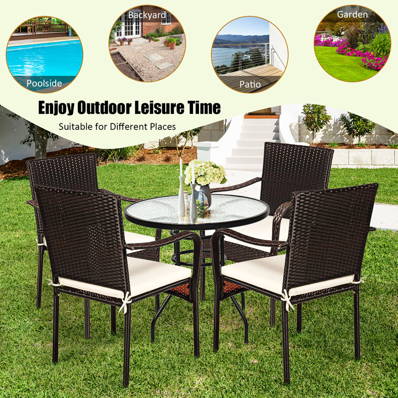 Set of 4 Brown Rattan Dining Chairs with Off-White Cushions