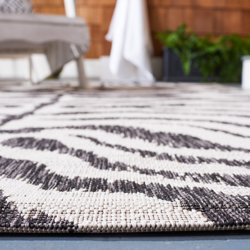 Ivory and Black Animal Print Indoor/Outdoor Rug