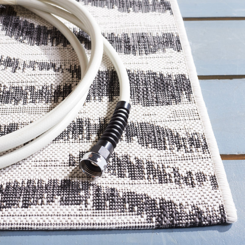 Ivory and Black Animal Print Indoor/Outdoor Rug