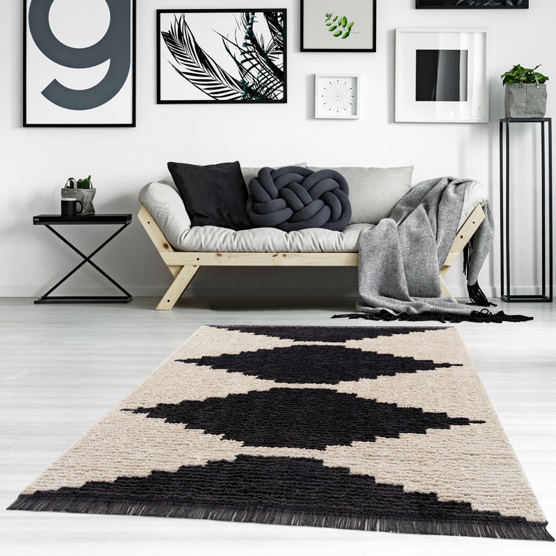 Allie Black & Ivory Synthetic 5' x 7' Easy-Care Area Rug