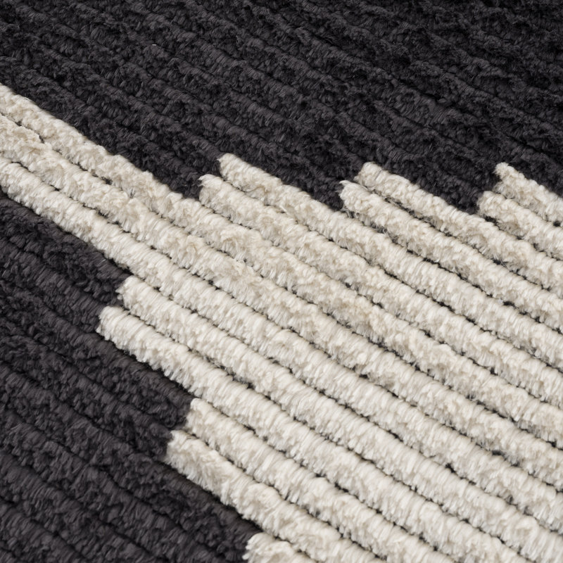 Allie Black & Ivory Synthetic 5' x 7' Easy-Care Area Rug