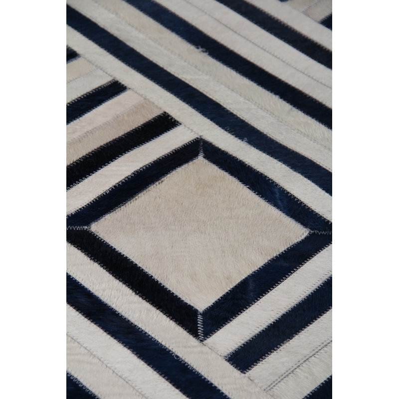 Handmade Ivory and Blue Geometric Cowhide Area Rug