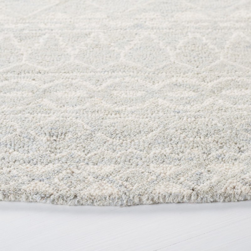 Ivory Hand-Knotted Wool 10' x 14' Area Rug