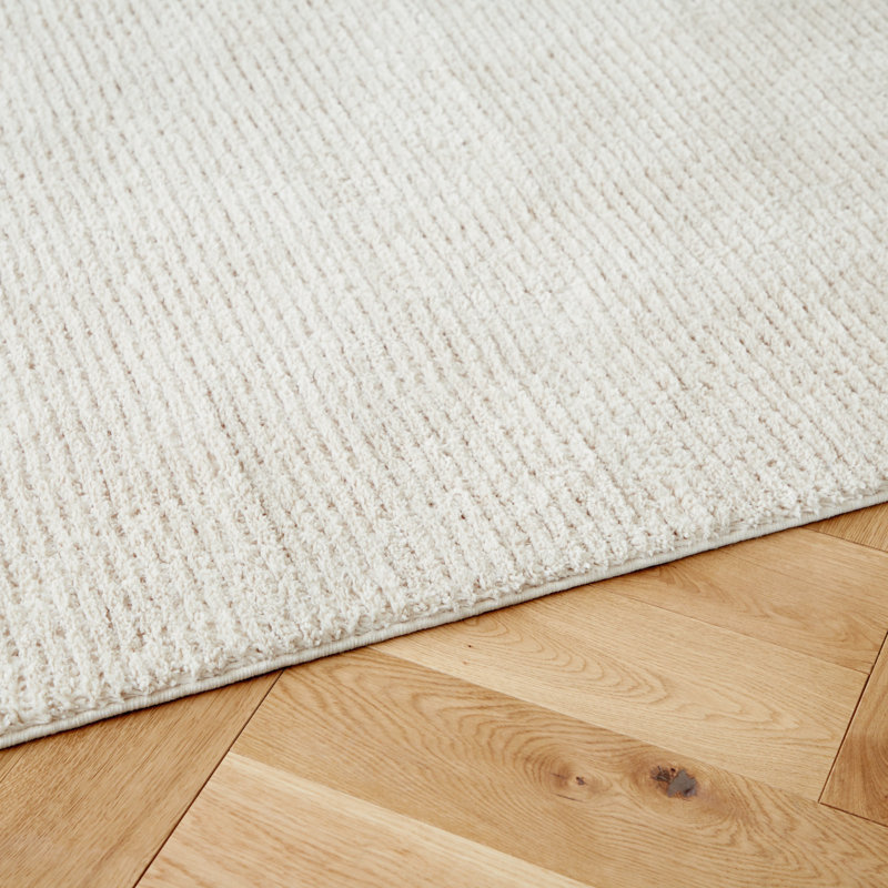 Sethmond Contemporary Ivory Striped Medium Synthetic Area Rug
