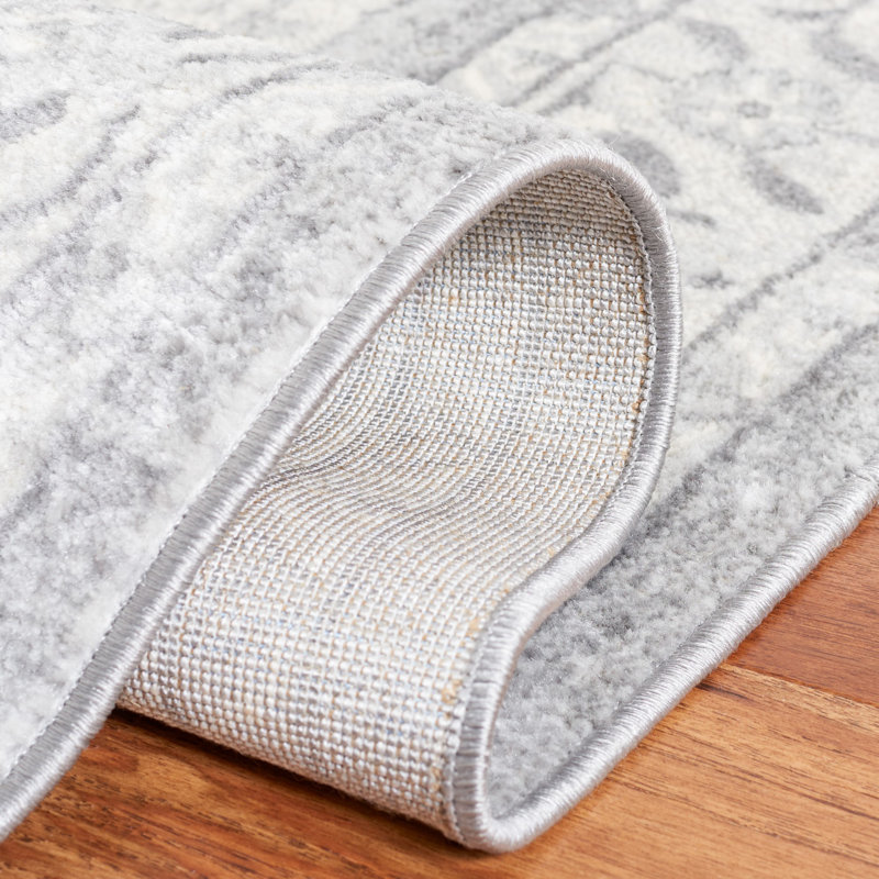 Heirloom Gray 9' x 12' Synthetic Hand-Knotted Area Rug