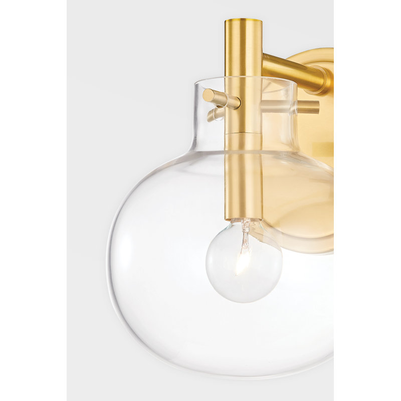 Elegant Aged Brass Dimmable Wall Sconce with Clear Globe