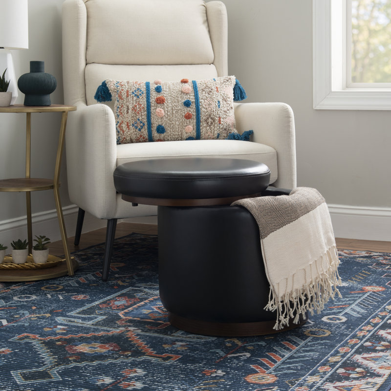 Addilynne Round Black Faux Leather Storage Ottoman