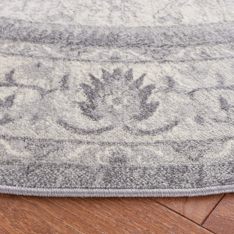 Heirloom Gray 9' x 12' Synthetic Hand-Knotted Area Rug